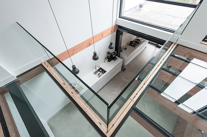 bloot refurbishes row house in the netherlands with a warm atmosphere and open spaces