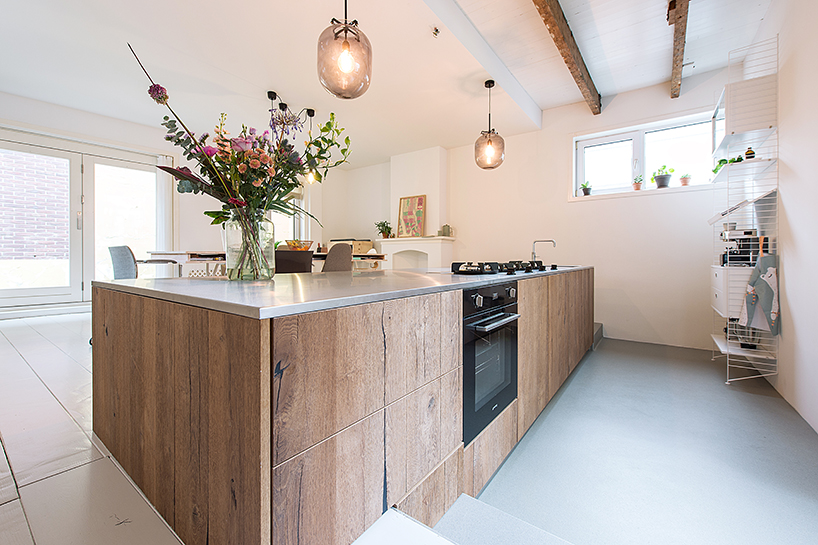 refurbished townhouse in the hague by bloot features sunken kitchen