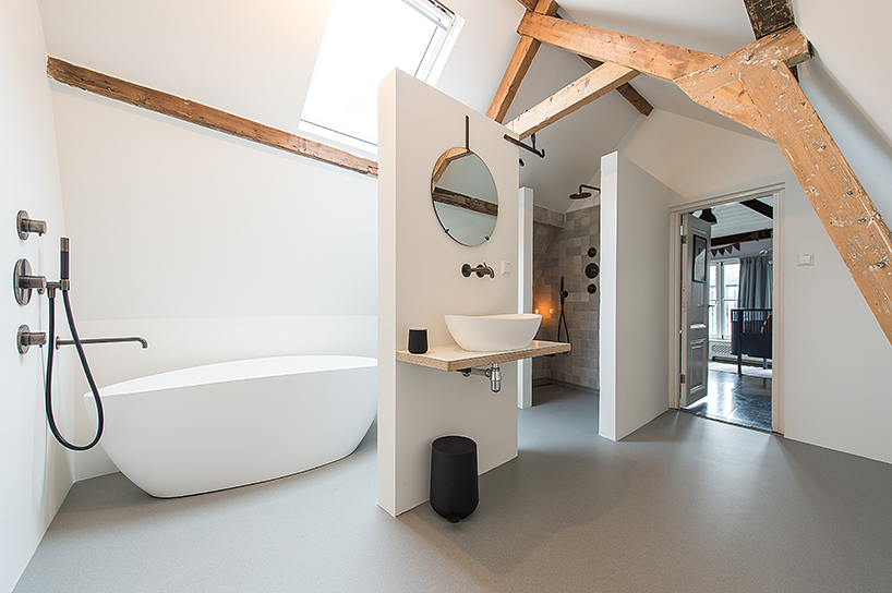 refurbished townhouse in the hague by bloot features sunken kitchen