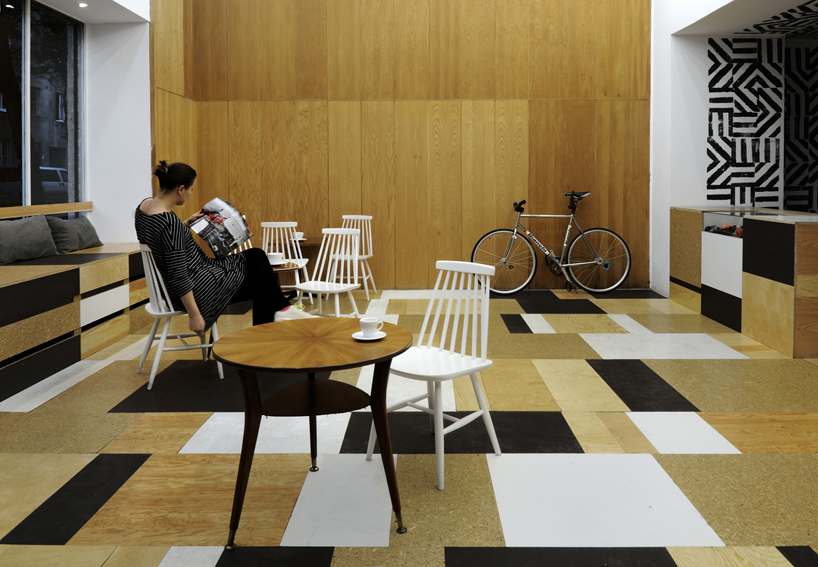 relaks cafe and bike repair shop by super super + moko architects