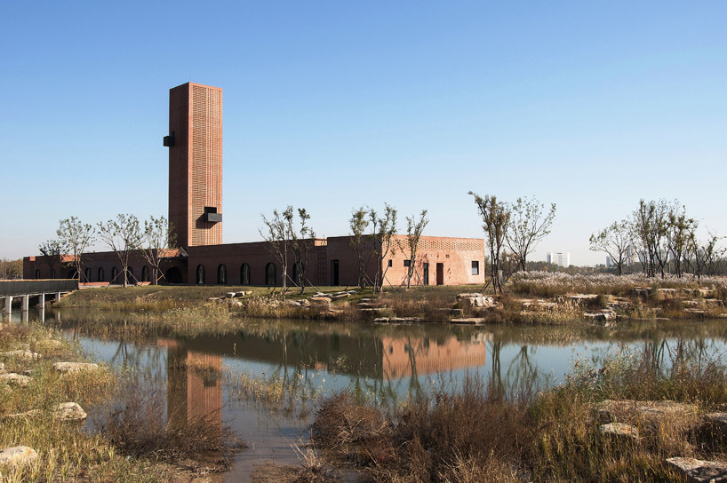 interval architects creates a botanic art center from a disused brick kiln in china