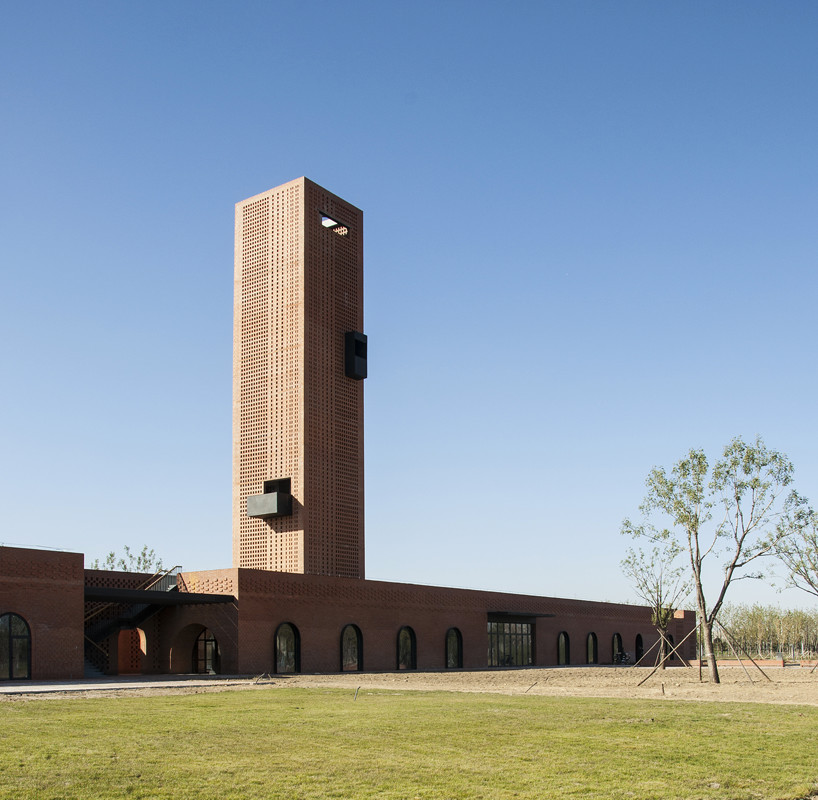 interval architects creates a botanic art center from a disused brick kiln in china