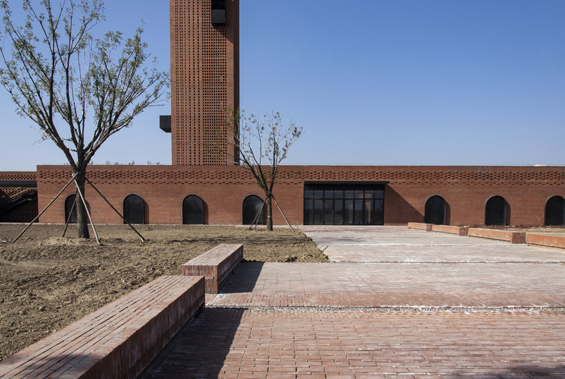 interval architects creates a botanic art center from a disused brick kiln in china