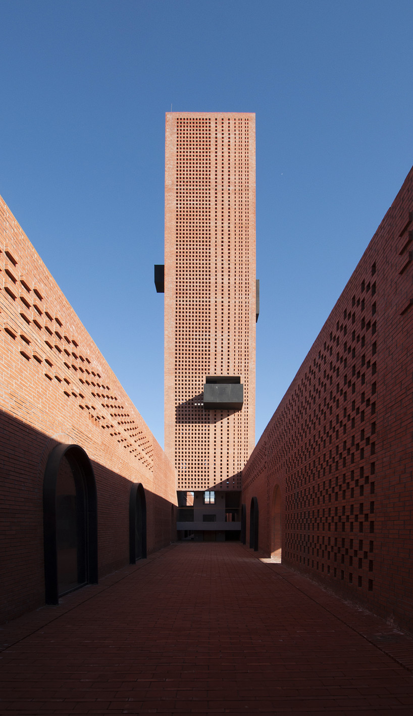 interval architects creates a botanic art center from a disused brick kiln in china