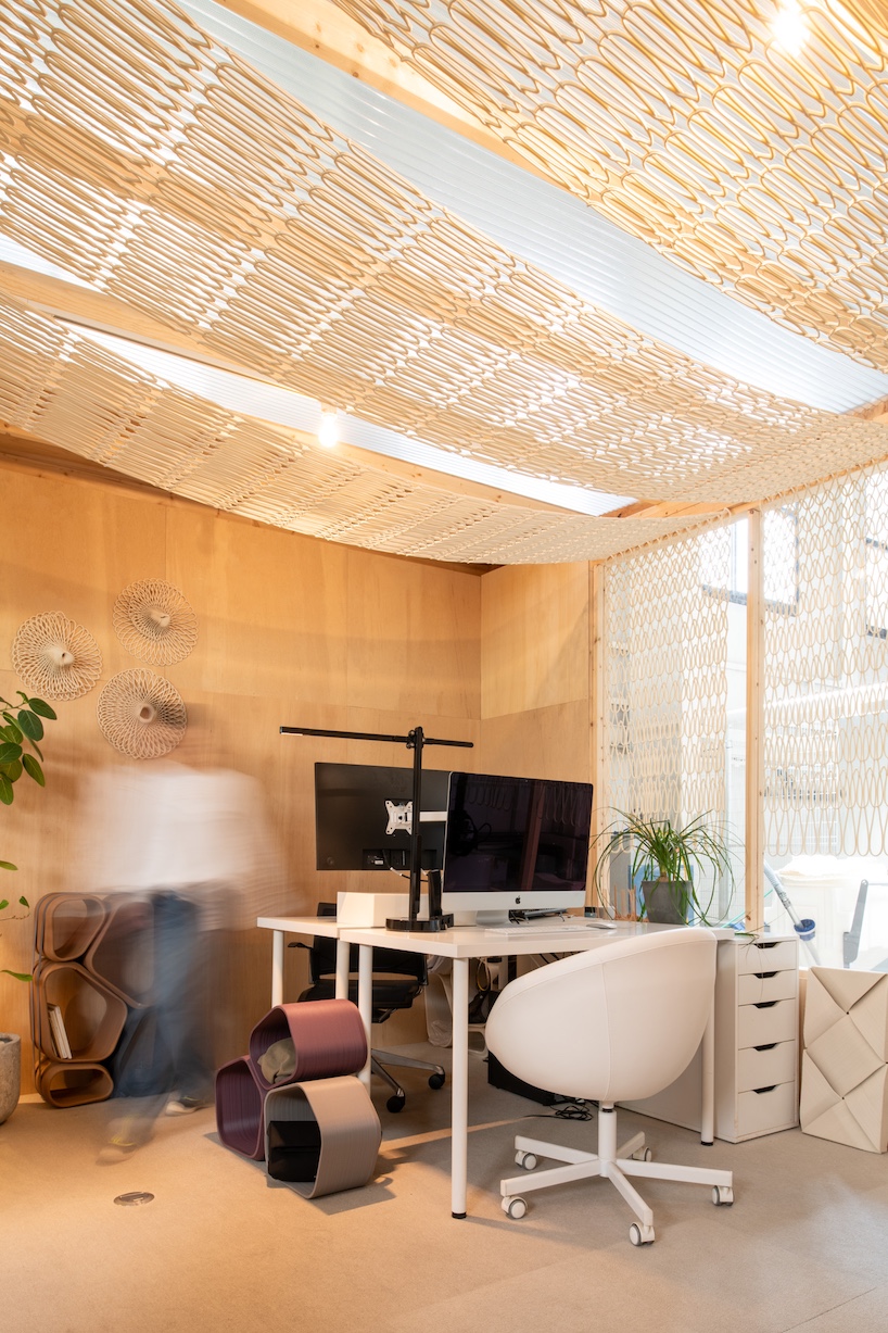 modular 3D printed facade wraps workspace in japan like knit textile