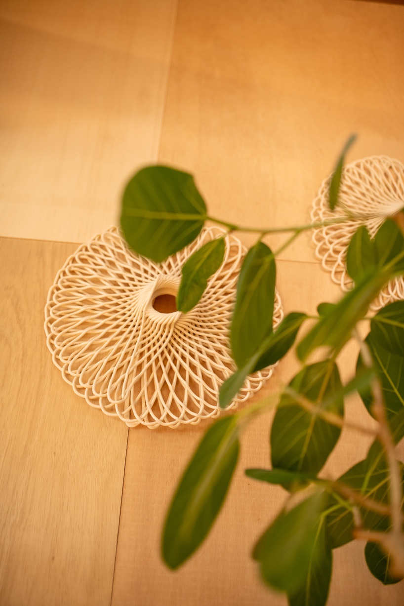 modular 3D printed facade wraps workspace in japan like knit textile