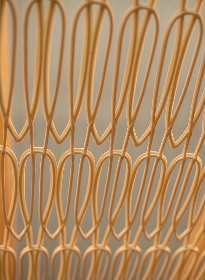 modular 3D printed facade wraps workspace in japan like knit textile