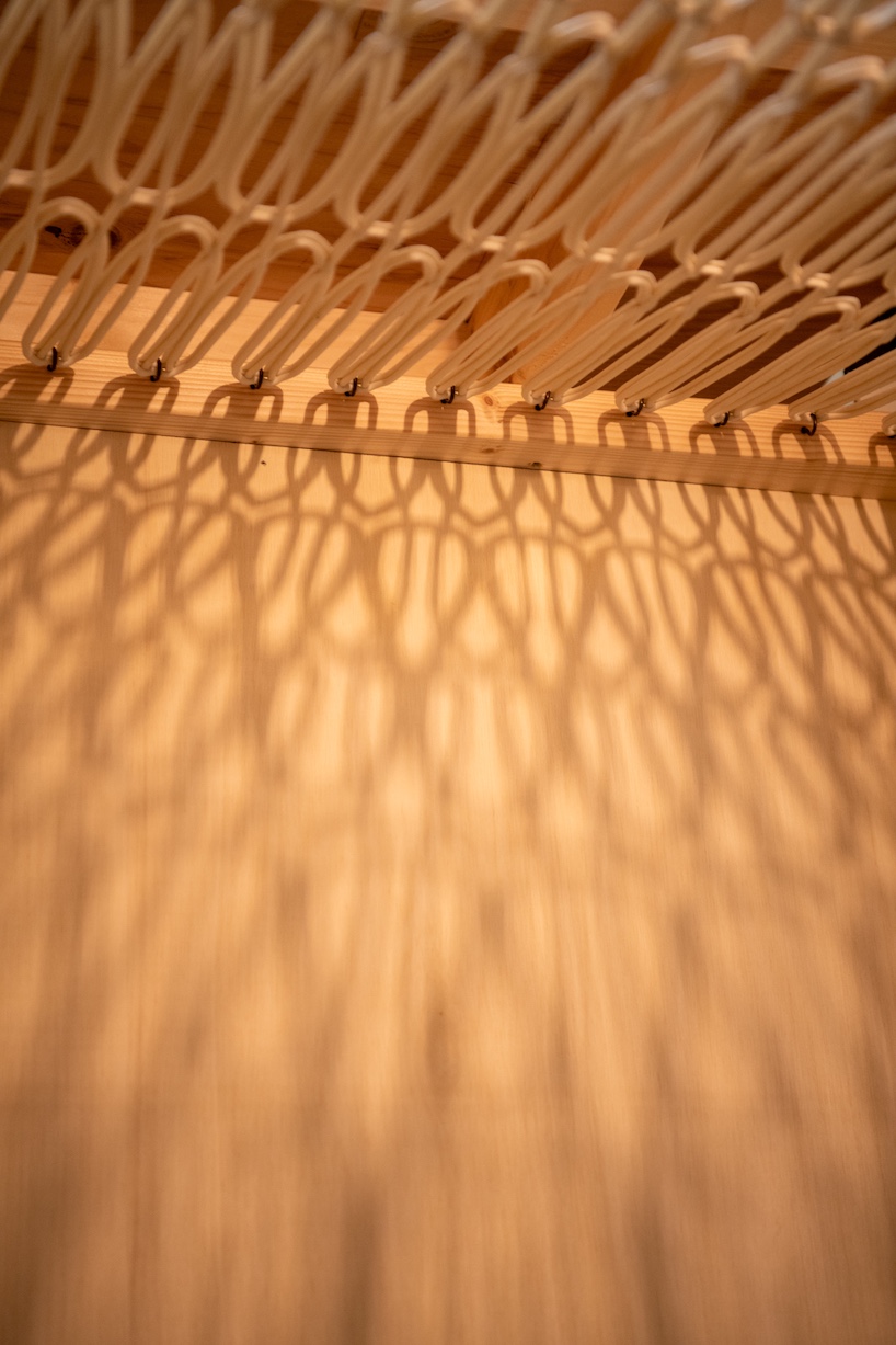 modular 3D printed facade wraps workspace in japan like knit textile