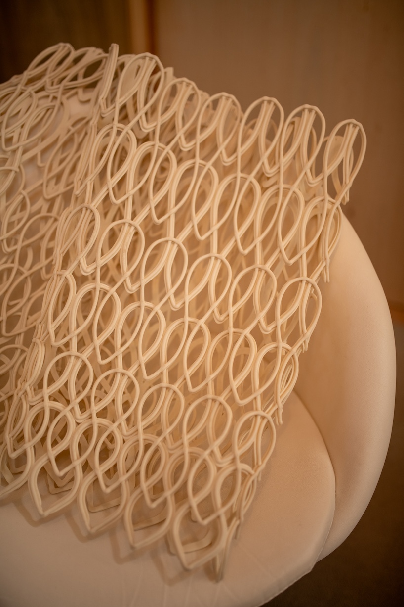 modular 3D printed facade wraps workspace in japan like knit textile