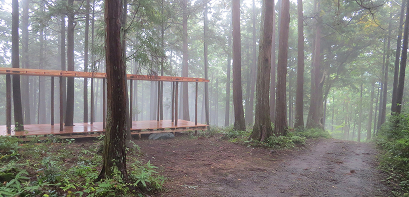 x-studio's wooden pavilion in japanese forest pays homage to black-ink paintings