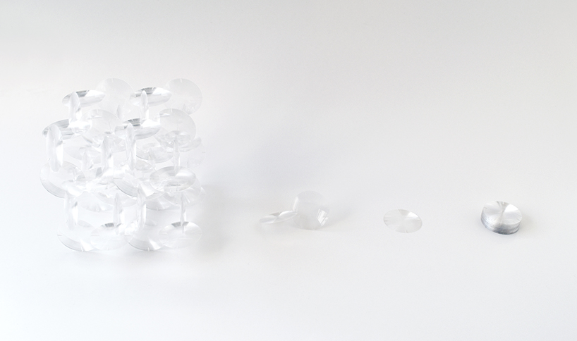 yuji okitsu combines an array of lenses into reflective 3D forms