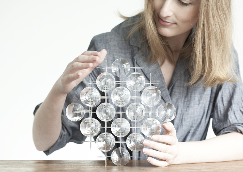 yuji okitsu combines an array of lenses into reflective 3D forms