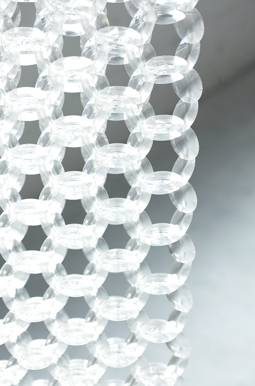yuji okitsu combines an array of lenses into reflective 3D forms