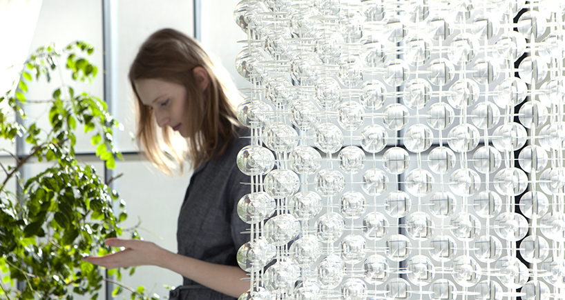 yuji okitsu combines an array of lenses into reflective 3D forms