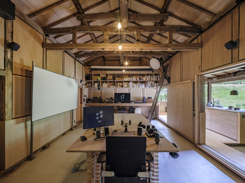 kurosawa kawara-ten revamps warehouse into multifunctional creative studio in japan