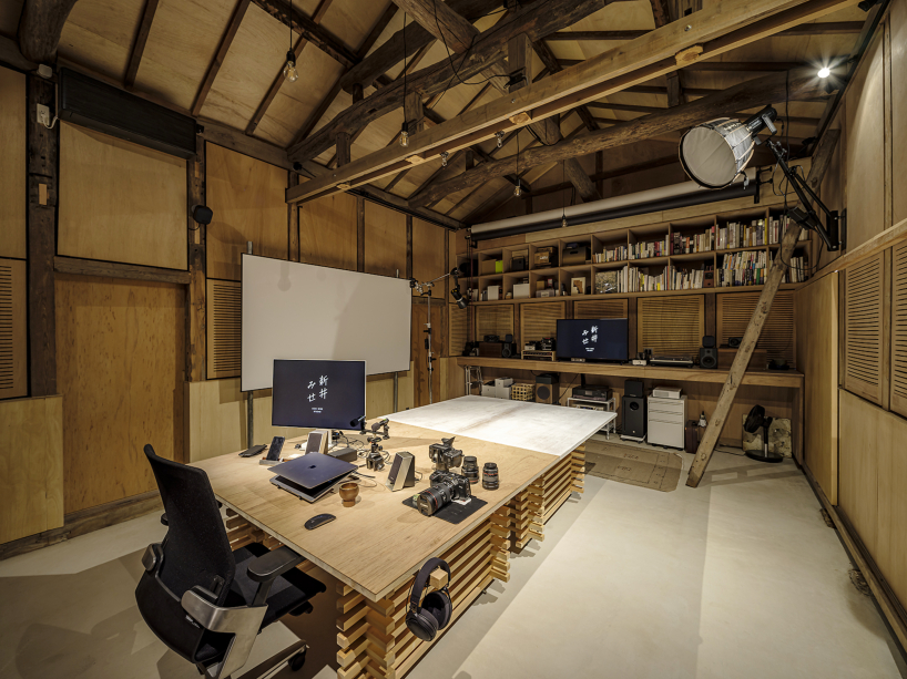 kurosawa kawara-ten revamps warehouse into multifunctional creative studio in japan