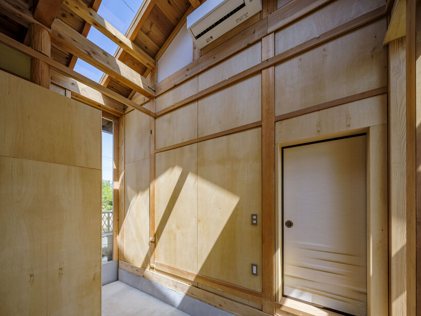 six-tatami garden tea room layers salvaged timber, titanium, and steel in ichihara, japan - 11