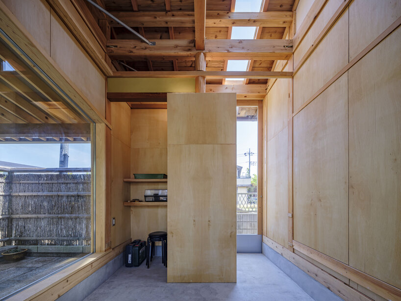 six-tatami garden tea room layers salvaged timber, titanium, and steel in ichihara, japan - 7