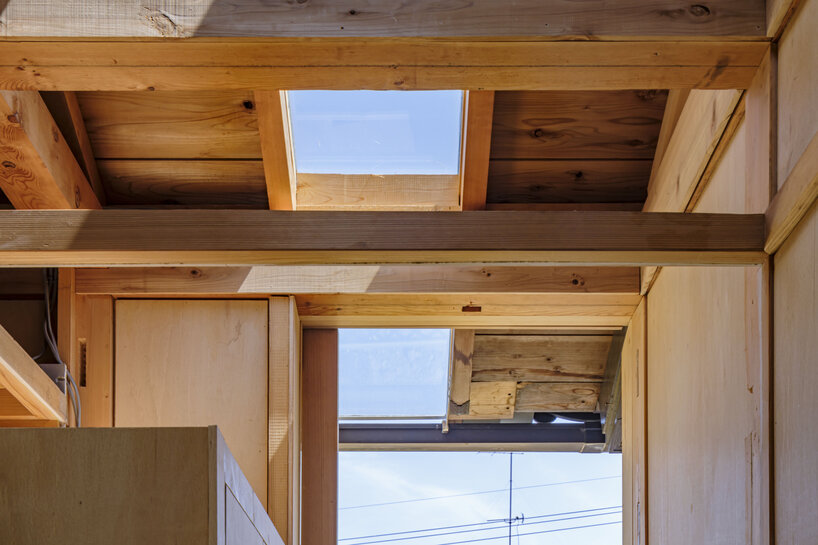 six-tatami garden tea room layers salvaged timber, titanium, and steel in ichihara, japan - 9