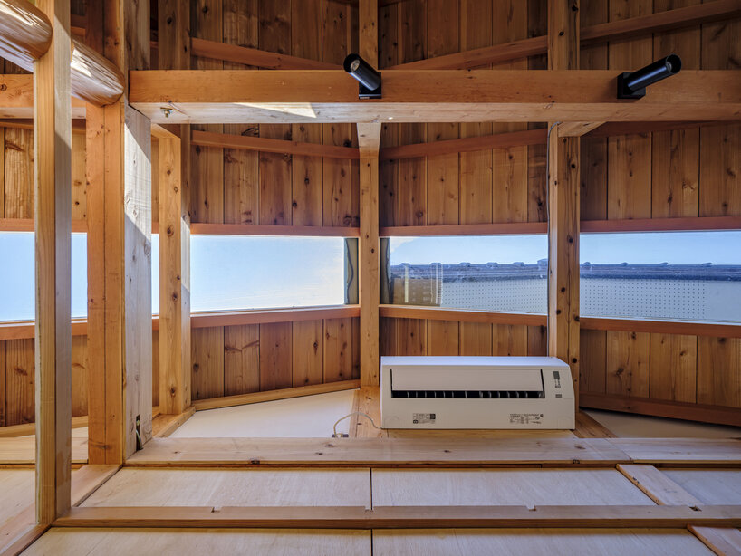 six-tatami garden tea room layers salvaged timber, titanium, and steel in ichihara, japan - 10