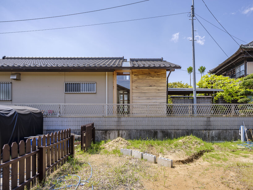 six-tatami garden tea room layers salvaged timber, titanium, and steel in ichihara, japan - 1