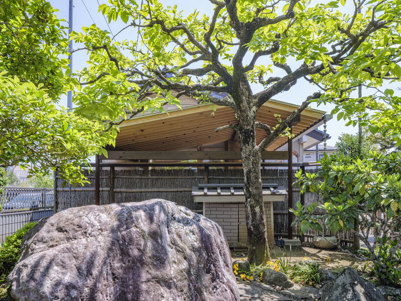 six-tatami garden tea room layers salvaged timber, titanium, and steel in ichihara, japan - 3
