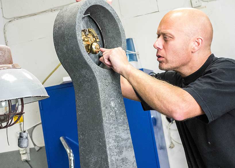 johan forsberg constructs grandfather clocks using concrete