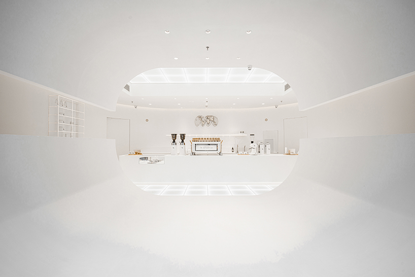 ARCHIEE's white minimalist coffee store fuses japanese, chinese, and parisian cultures