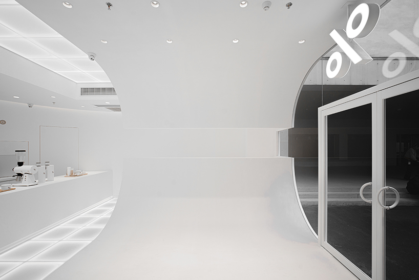 ARCHIEE's white minimalist coffee store fuses japanese, chinese, and parisian cultures