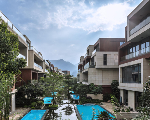 NEXT architects surrounds housing complex with water and lush greenery in china