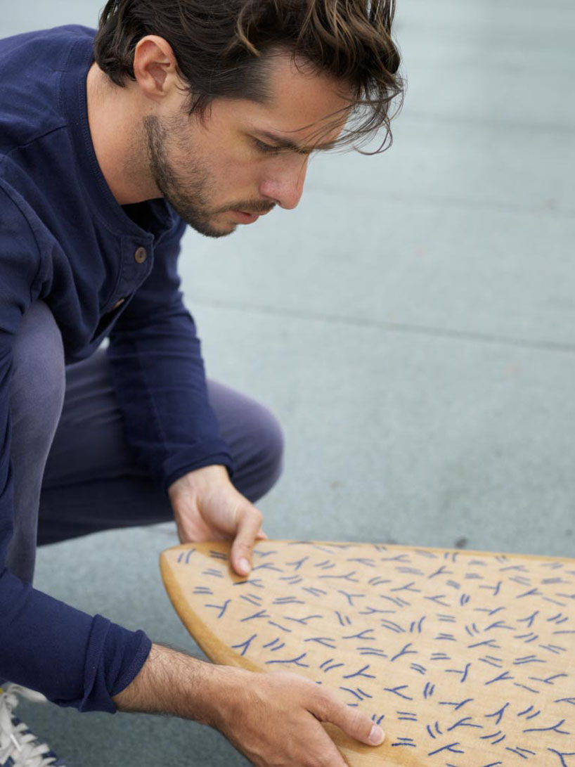 trust in design embroiders pattern into splash surfboard