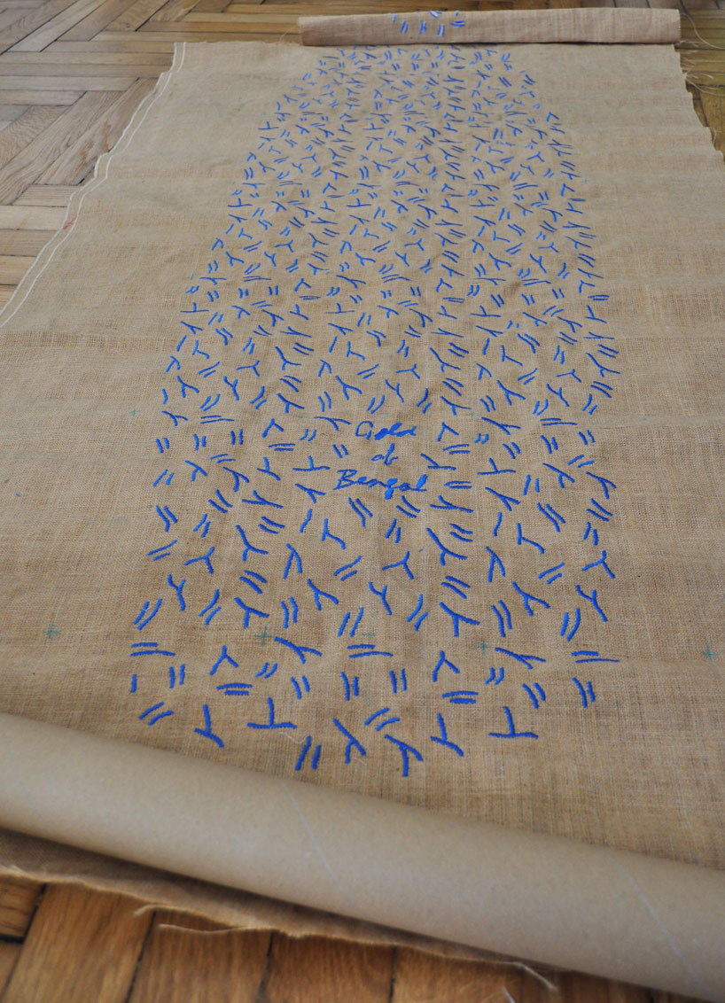 trust in design embroiders pattern into splash surfboard