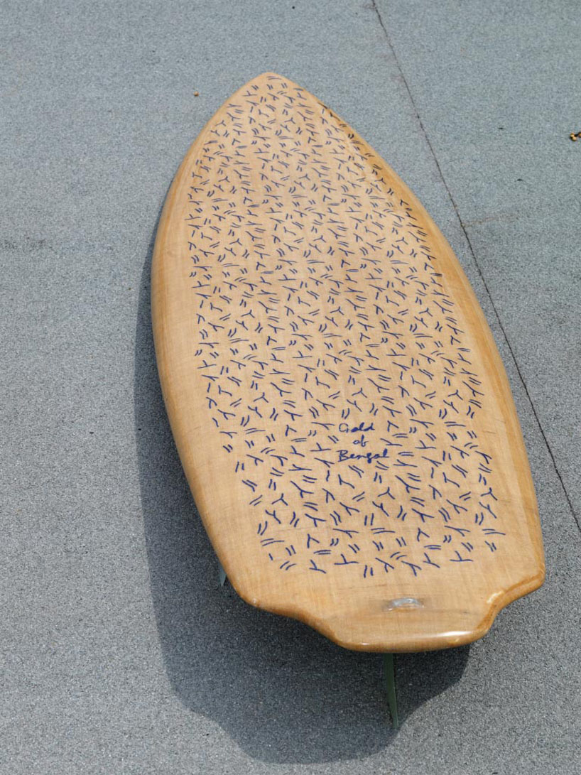 trust in design embroiders pattern into splash surfboard