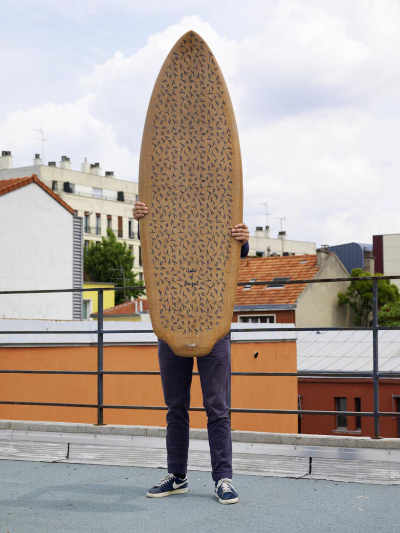 trust in design embroiders pattern into splash surfboard