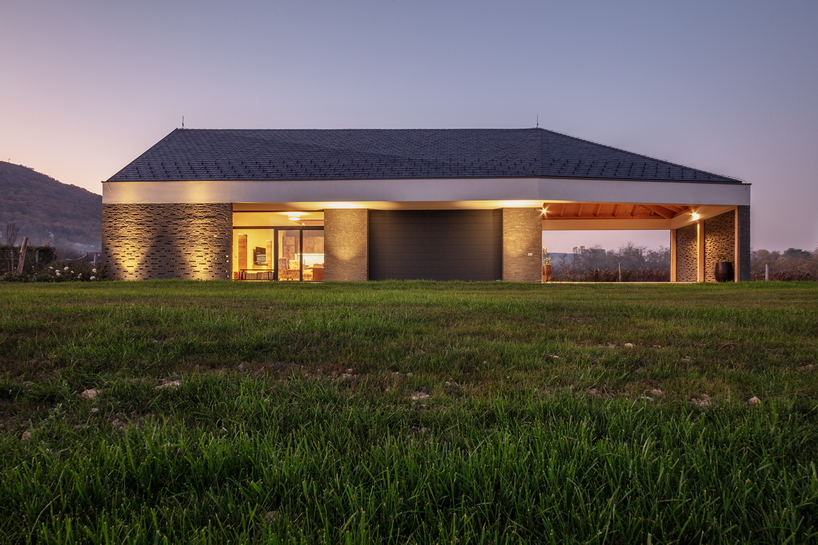 the winemaker's house by SAGRA architects builds on local traditions in rural hungary