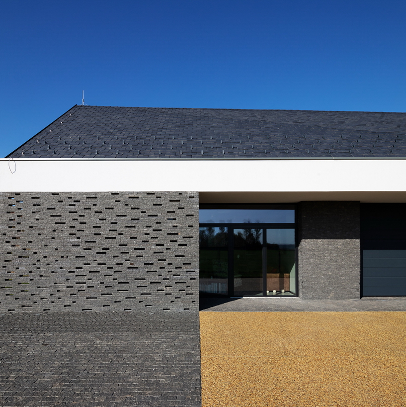 the winemaker's house by SAGRA architects builds on local traditions in rural hungary