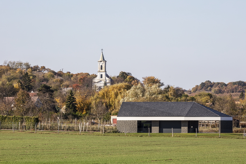 the winemaker's house by SAGRA architects builds on local traditions in rural hungary