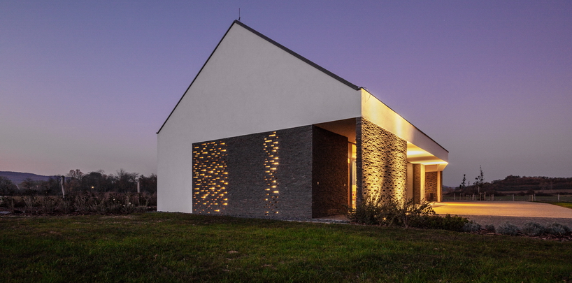 the winemaker's house by SAGRA architects builds on local traditions in rural hungary