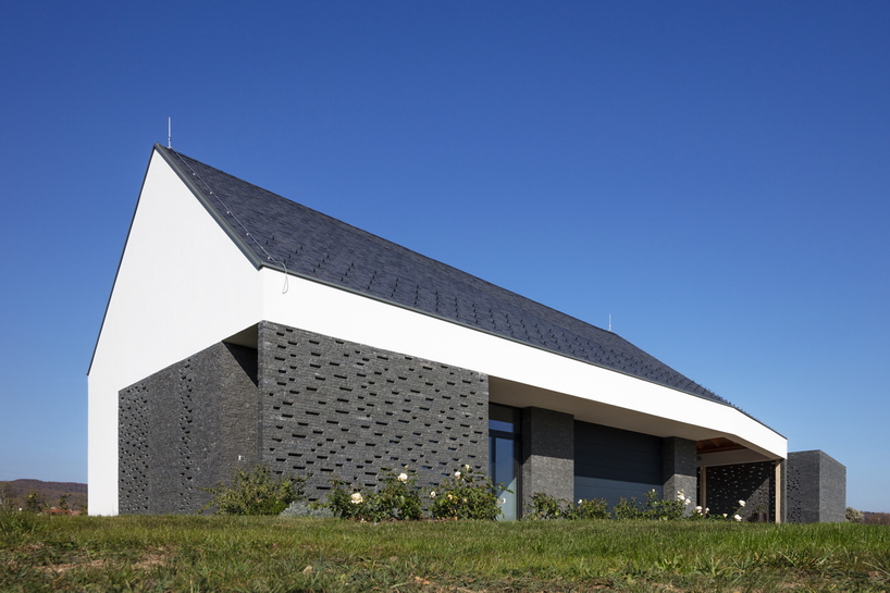the winemaker's house by SAGRA architects builds on local traditions in rural hungary