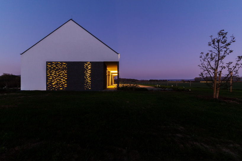 the winemaker's house by SAGRA architects builds on local traditions in rural hungary