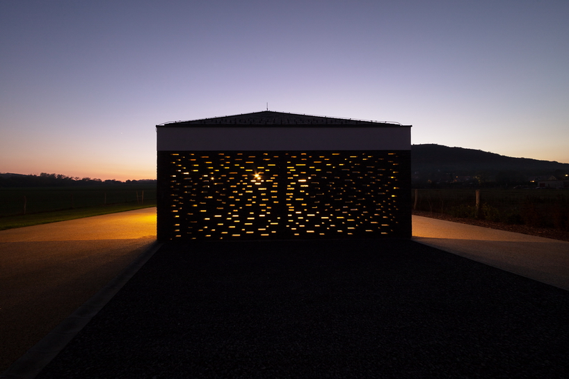 the winemaker's house by SAGRA architects builds on local traditions in rural hungary