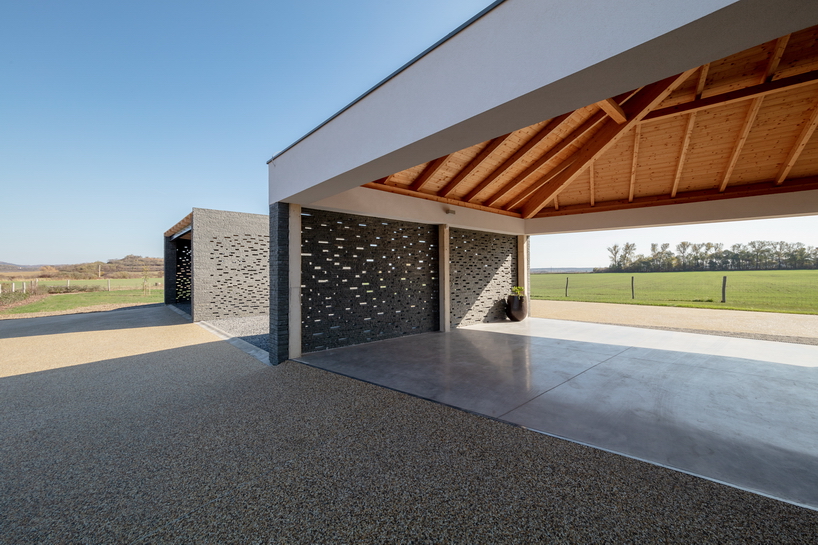the winemaker's house by SAGRA architects builds on local traditions in rural hungary