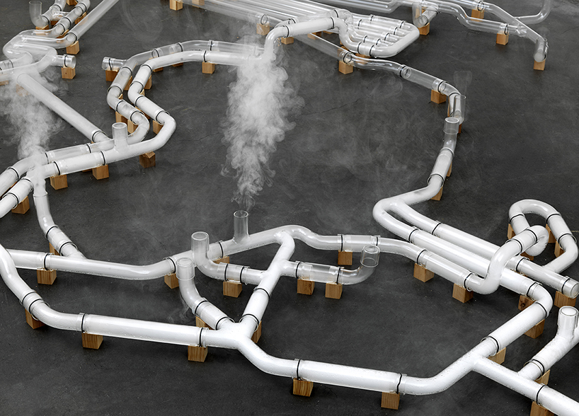 jeroen vaan loon materializes a glass internet filled with smoke signals