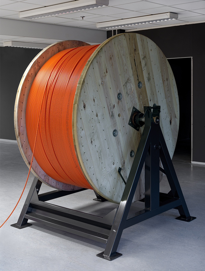 jeroen van loon prints the entire gutenberg bible onto fiber optic cable designboom