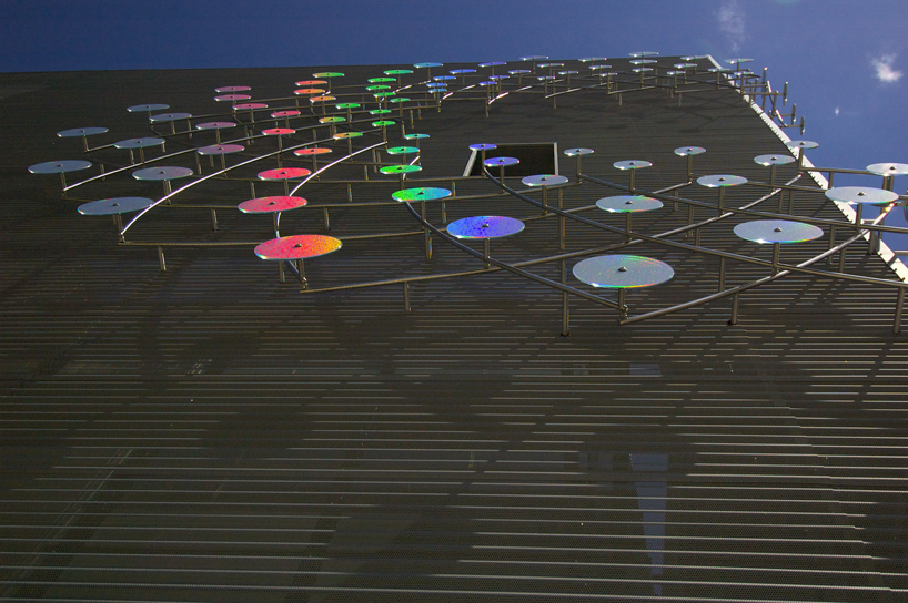 split spiral facade installation by ray king