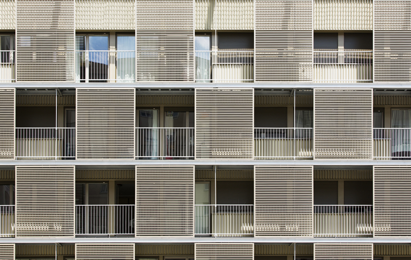 atelier du pont revitalize social housing block with new facade