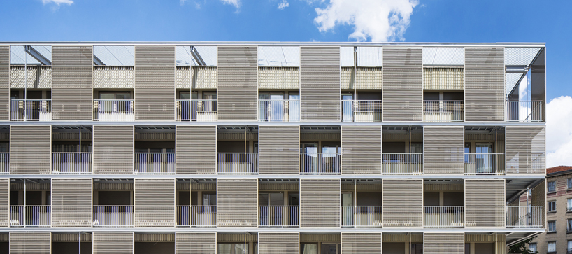 atelier du pont revitalize social housing block with new facade