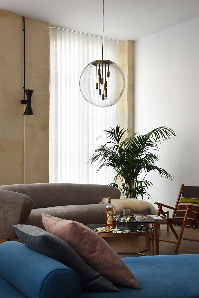 atelier du pont uses timber and terrazzo to refurbish apartment in paris designboom