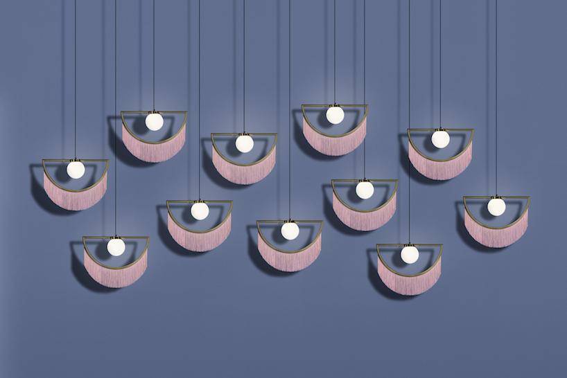 houtique + masquespacio's wink lamps feature carefully crafted pink fringes