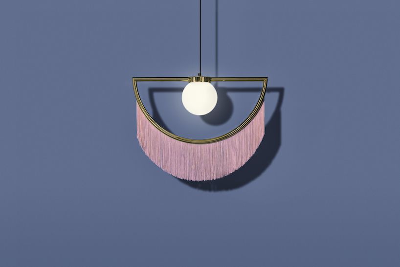 houtique + masquespacio's wink lamps feature carefully crafted pink fringes